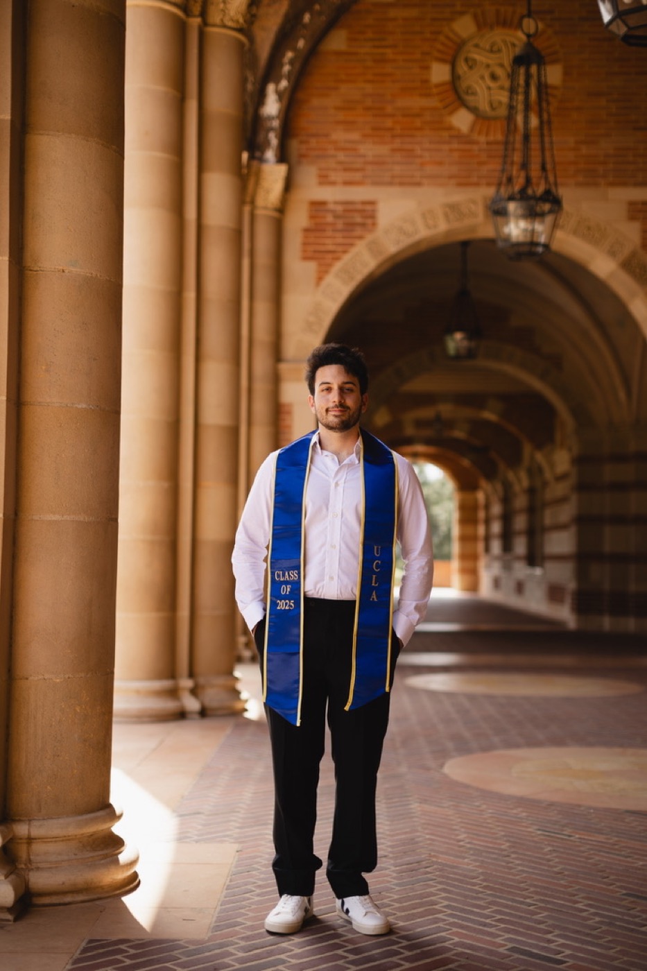 Doruk Cinalioglu at UCLA's Royce Hall arcade, graduation 2025